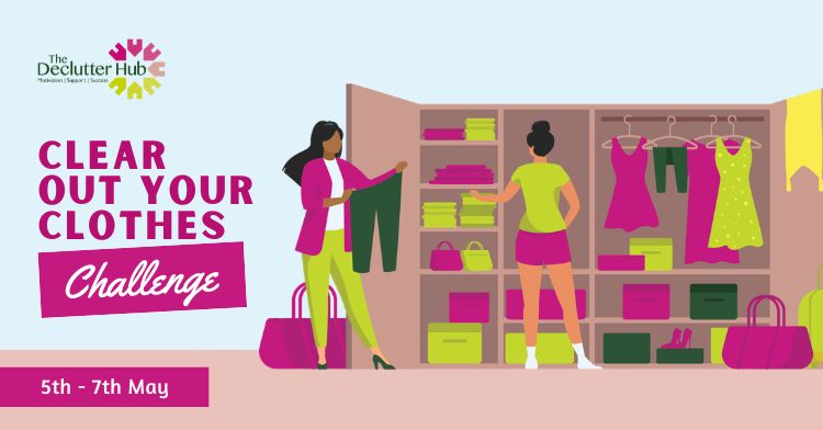 Two women clearing out a wardrobe